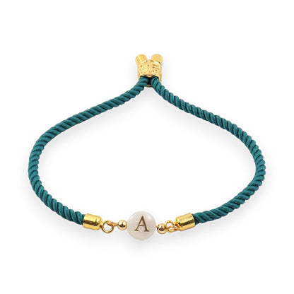 https://cdn.shopify.com/s/files/1/0820/4999/0943/files/adjustable-dainty-letter-initial-bracelet-894154.jpg?v=1712446128