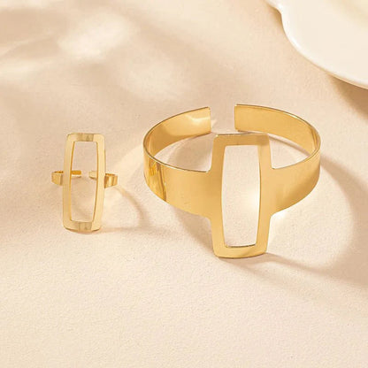 https://cdn.shopify.com/s/files/1/0820/4999/0943/files/adjustable-geometric-rectangle-bracelet-and-ring-set-296143.webp?v=1718190962