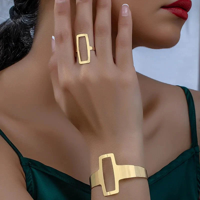https://cdn.shopify.com/s/files/1/0820/4999/0943/files/adjustable-geometric-rectangle-bracelet-and-ring-set-403190.webp?v=1718190962