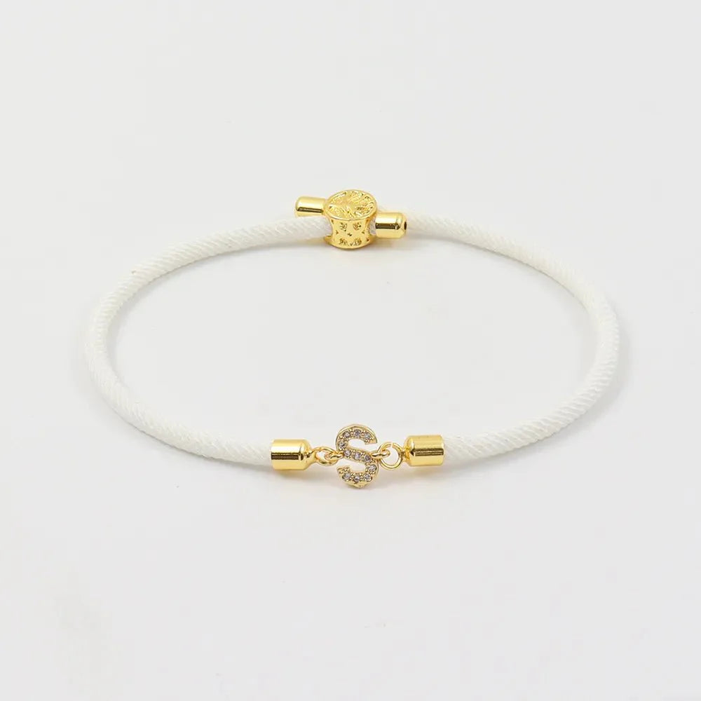 https://cdn.shopify.com/s/files/1/0820/4999/0943/files/adjustable-letter-initial-bracelets-253134.webp?v=1735136815