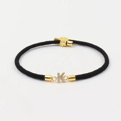 https://cdn.shopify.com/s/files/1/0820/4999/0943/files/adjustable-letter-initial-bracelets-896209.webp?v=1735136815