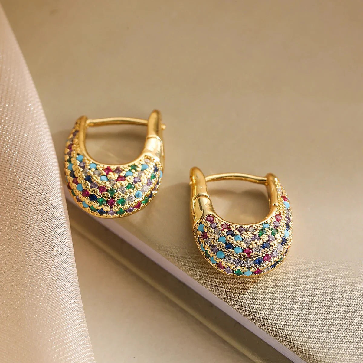 https://cdn.shopify.com/s/files/1/0820/4999/0943/files/chunky-glittering-diamond-hoop-earrings-152849.webp?v=1718605381