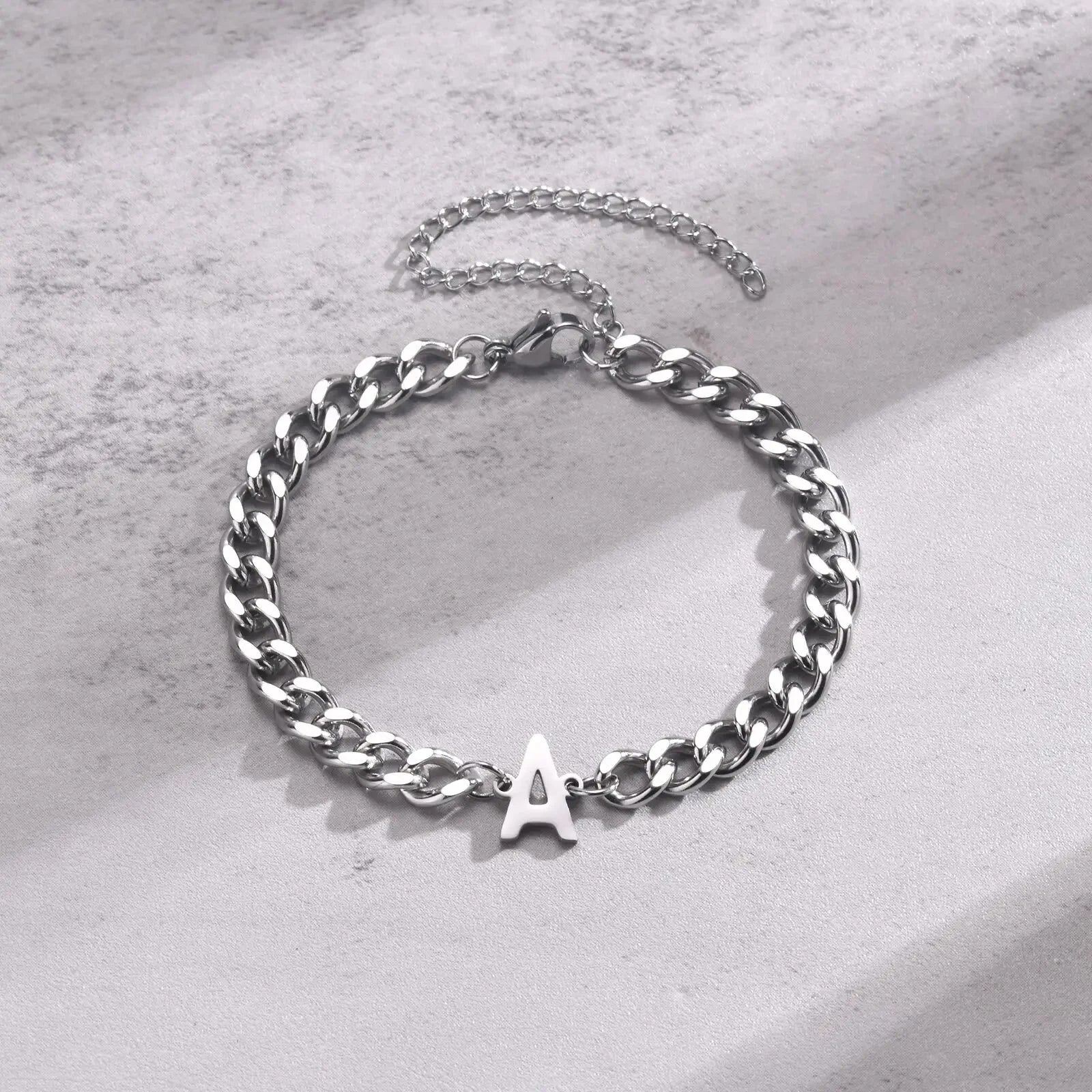 https://cdn.shopify.com/s/files/1/0820/4999/0943/files/couples-letter-initial-cuban-bracelet-806995.webp?v=1723659951
