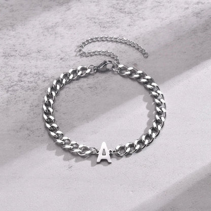 https://cdn.shopify.com/s/files/1/0820/4999/0943/files/couples-letter-initial-cuban-bracelet-806995.webp?v=1723659951