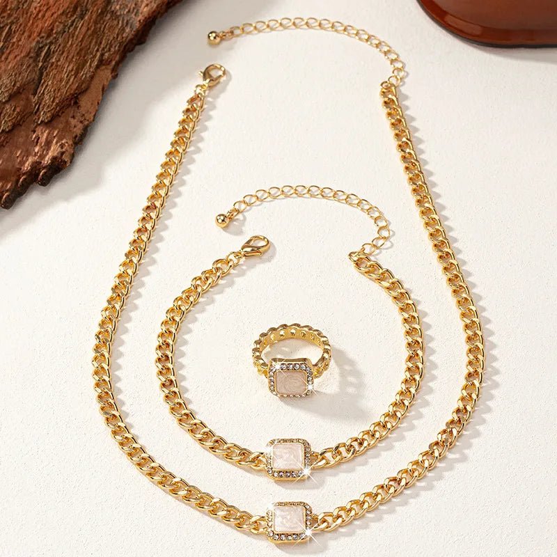https://cdn.shopify.com/s/files/1/0820/4999/0943/files/cuban-square-diamond-necklace-bracelet-and-ring-set-745827.webp?v=1721837032