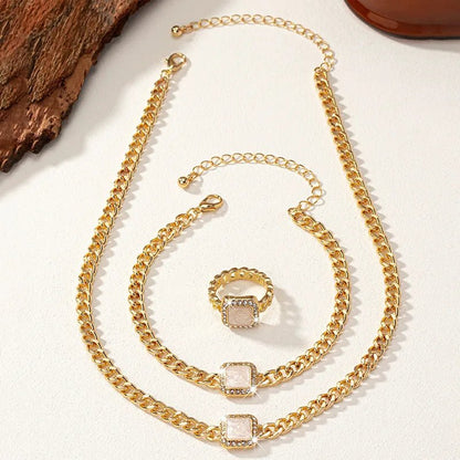 https://cdn.shopify.com/s/files/1/0820/4999/0943/files/cuban-square-diamond-necklace-bracelet-and-ring-set-745827.webp?v=1721837032