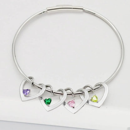 https://cdn.shopify.com/s/files/1/0820/4999/0943/files/dainty-name-birthstone-heart-charm-bangle-bracelet-necklace-544783.webp?v=1724654253