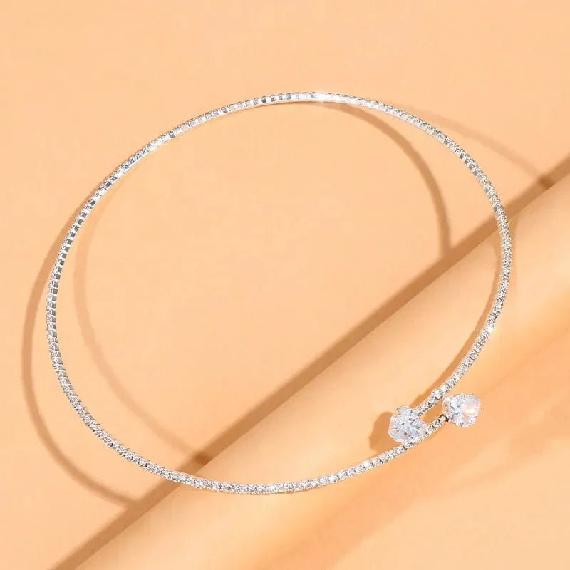 https://cdn.shopify.com/s/files/1/0820/4999/0943/files/diamond-heart-open-choker-necklace-236694.webp?v=1718688172