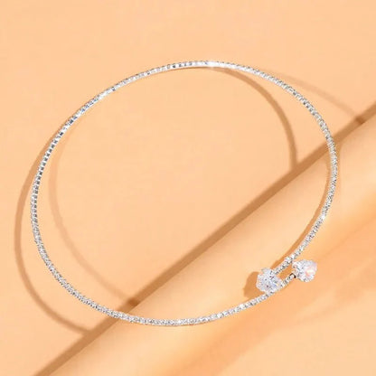 https://cdn.shopify.com/s/files/1/0820/4999/0943/files/diamond-heart-open-choker-necklace-236694.webp?v=1718688172