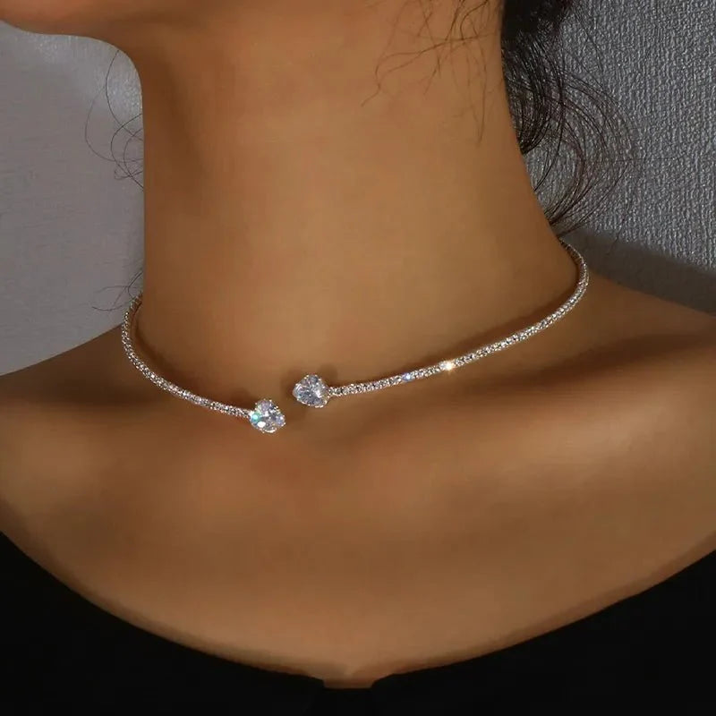 https://cdn.shopify.com/s/files/1/0820/4999/0943/files/diamond-heart-open-choker-necklace-346374.webp?v=1718688172