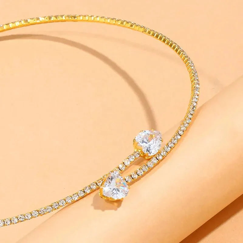 https://cdn.shopify.com/s/files/1/0820/4999/0943/files/diamond-heart-open-choker-necklace-401434.webp?v=1718688172
