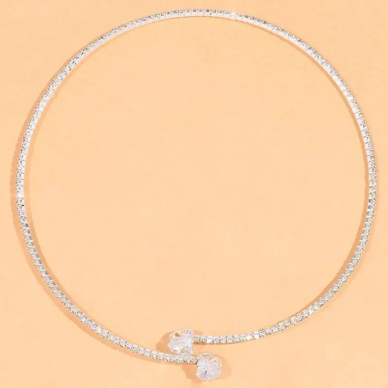 https://cdn.shopify.com/s/files/1/0820/4999/0943/files/diamond-heart-open-choker-necklace-461931.webp?v=1718688172
