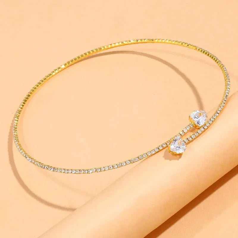 https://cdn.shopify.com/s/files/1/0820/4999/0943/files/diamond-heart-open-choker-necklace-622283.webp?v=1718688172