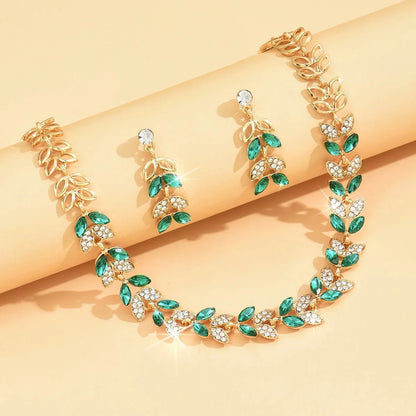 https://cdn.shopify.com/s/files/1/0820/4999/0943/files/emerald-leaf-diamond-necklace-and-earring-set-137274.webp?v=1718191083