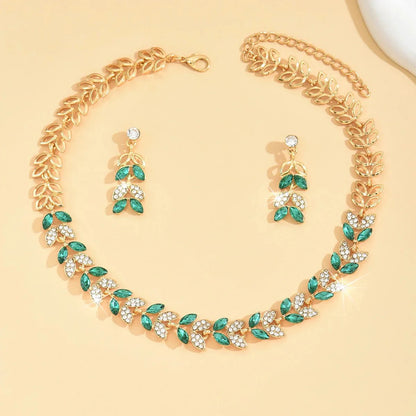 https://cdn.shopify.com/s/files/1/0820/4999/0943/files/emerald-leaf-diamond-necklace-and-earring-set-300382.webp?v=1718191083