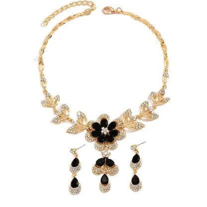 https://cdn.shopify.com/s/files/1/0820/4999/0943/files/floral-black-and-gold-diamond-necklace-and-earring-set-254581.jpg?v=1718191087