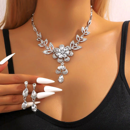 https://cdn.shopify.com/s/files/1/0820/4999/0943/files/floral-diamond-necklace-and-earring-set-194032.jpg?v=1720594148