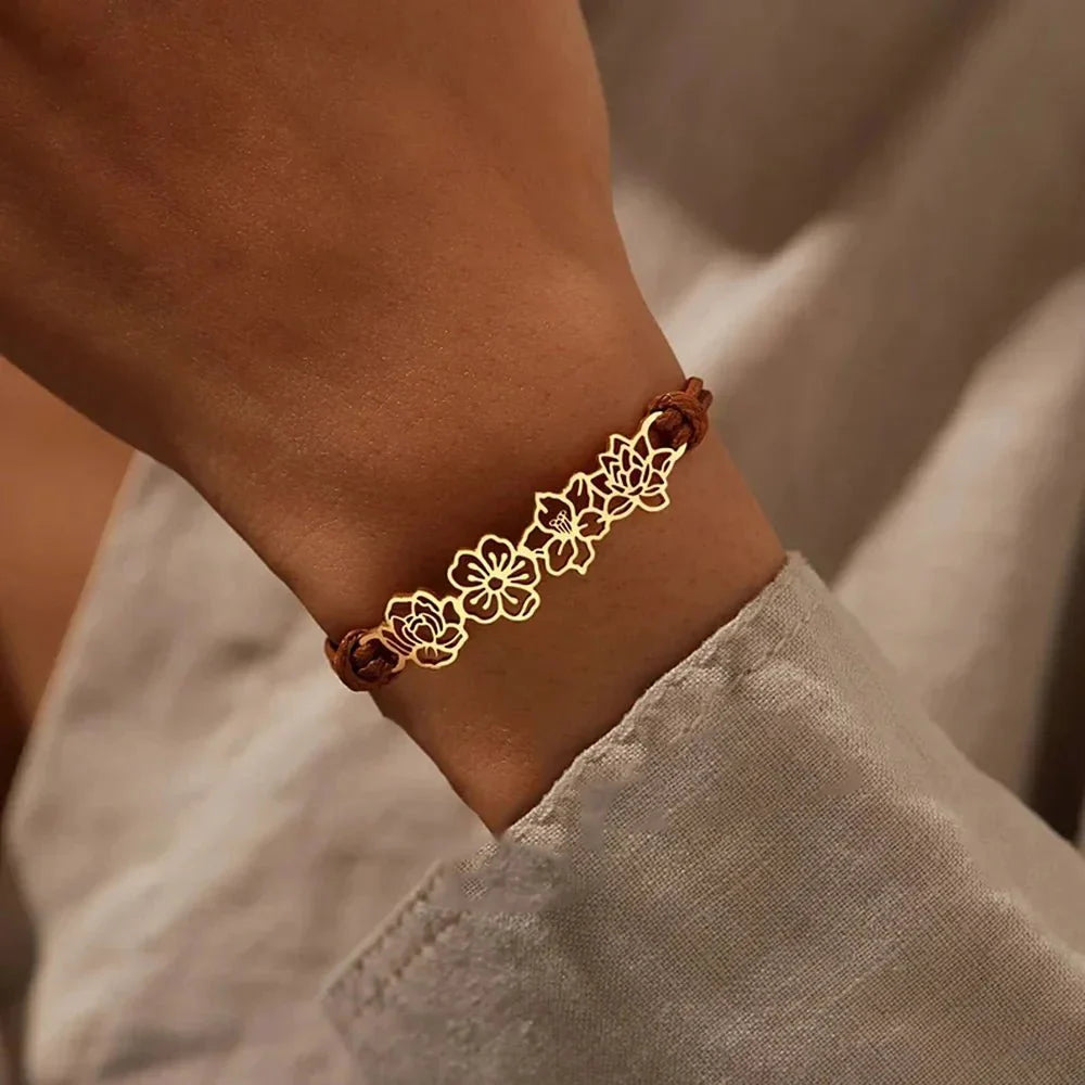 https://cdn.shopify.com/s/files/1/0820/4999/0943/files/personalized-birth-flower-bracelet-373432.webp?v=1762198577