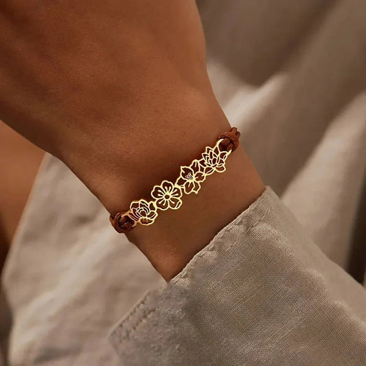 https://cdn.shopify.com/s/files/1/0820/4999/0943/files/personalized-birth-flower-bracelet-373432.webp?v=1762198577